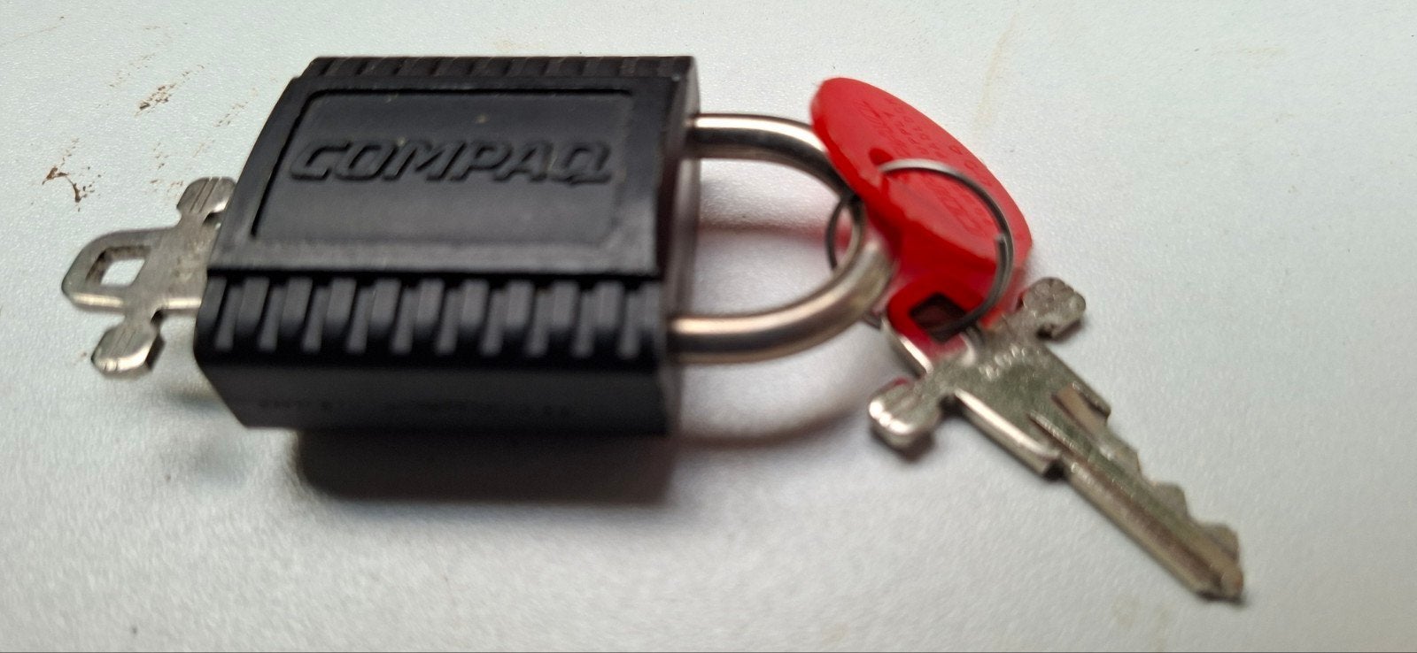Origineel Compaq slotje met 2 sleutels, Ophalen, Gebruikt, Overige materialen, Slot