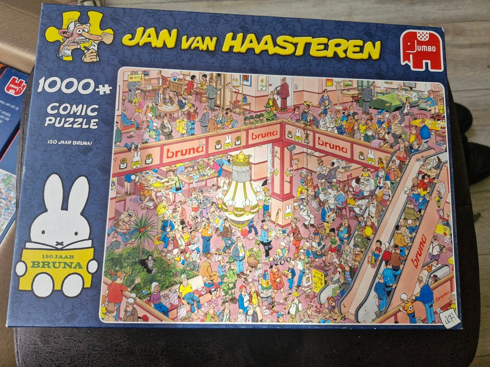 Jan van haasteren puzzel, 150 jaar Bruna 1000 stukjes, Ophalen of Verzenden, 500 t/m 1500 stukjes, Zo goed als nieuw, Legpuzzel