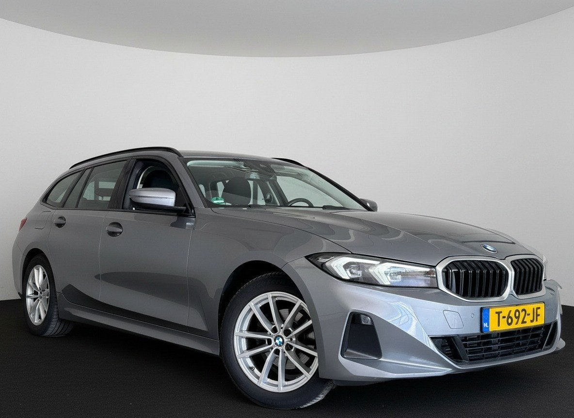 BMW 3 Serie Touring NEW 318IA 2.0 156PK AUT. NAVI/LED/PDC/CA, Auto's, Gebruikt, Origineel Nederlands, 3-Serie, Zilver of Grijs