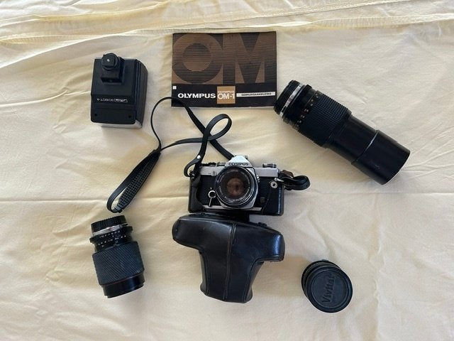 Olympus OM-1 Spiegelreflexcamera met 2 lenzen en flitser, Ophalen of Verzenden, Gebruikt, Spiegelreflex, Olympus