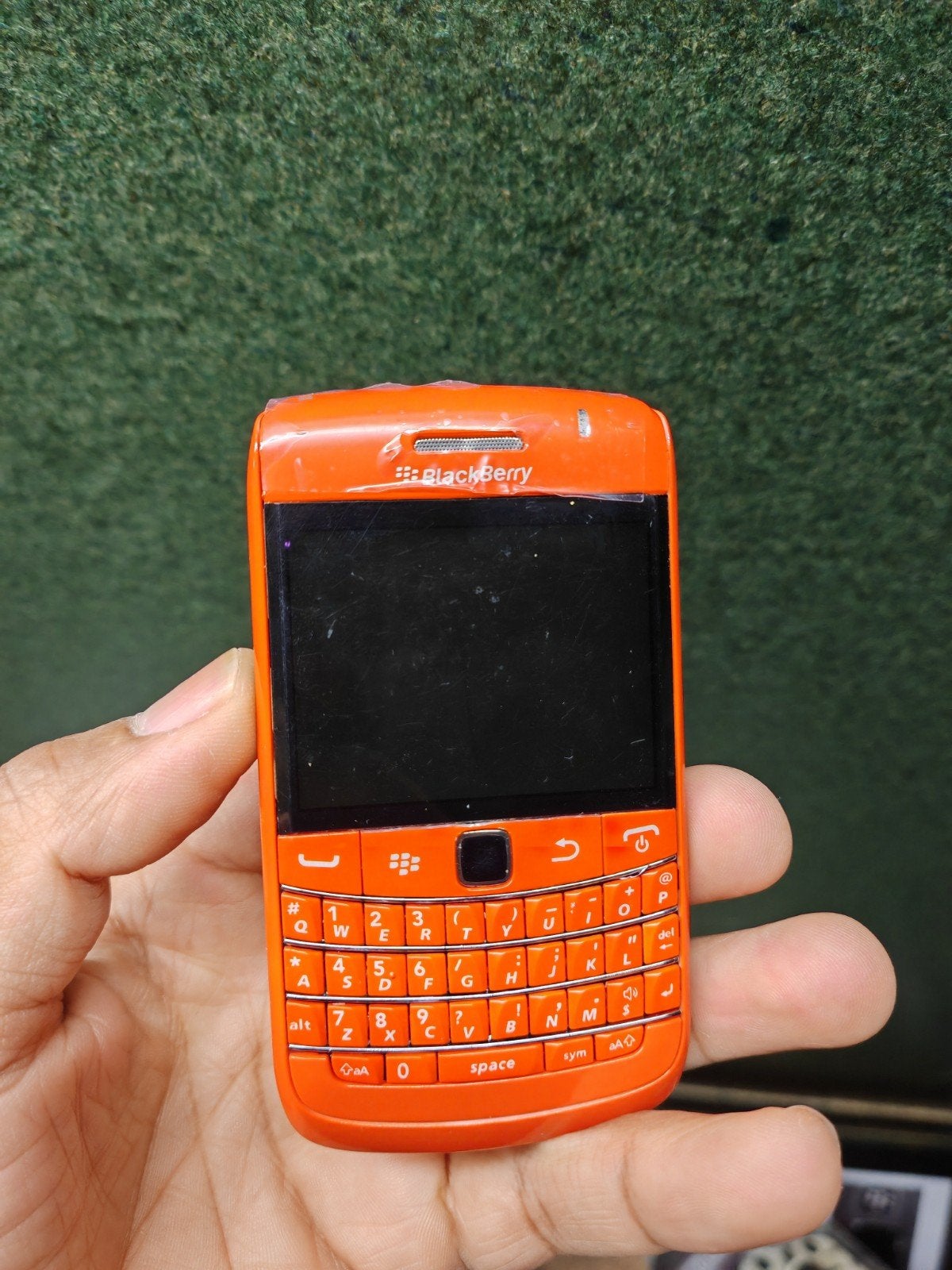 Goedwerkende oranje blackberry bold 9780 met fysiek toetsenb, Ophalen of Verzenden, Zo goed als nieuw