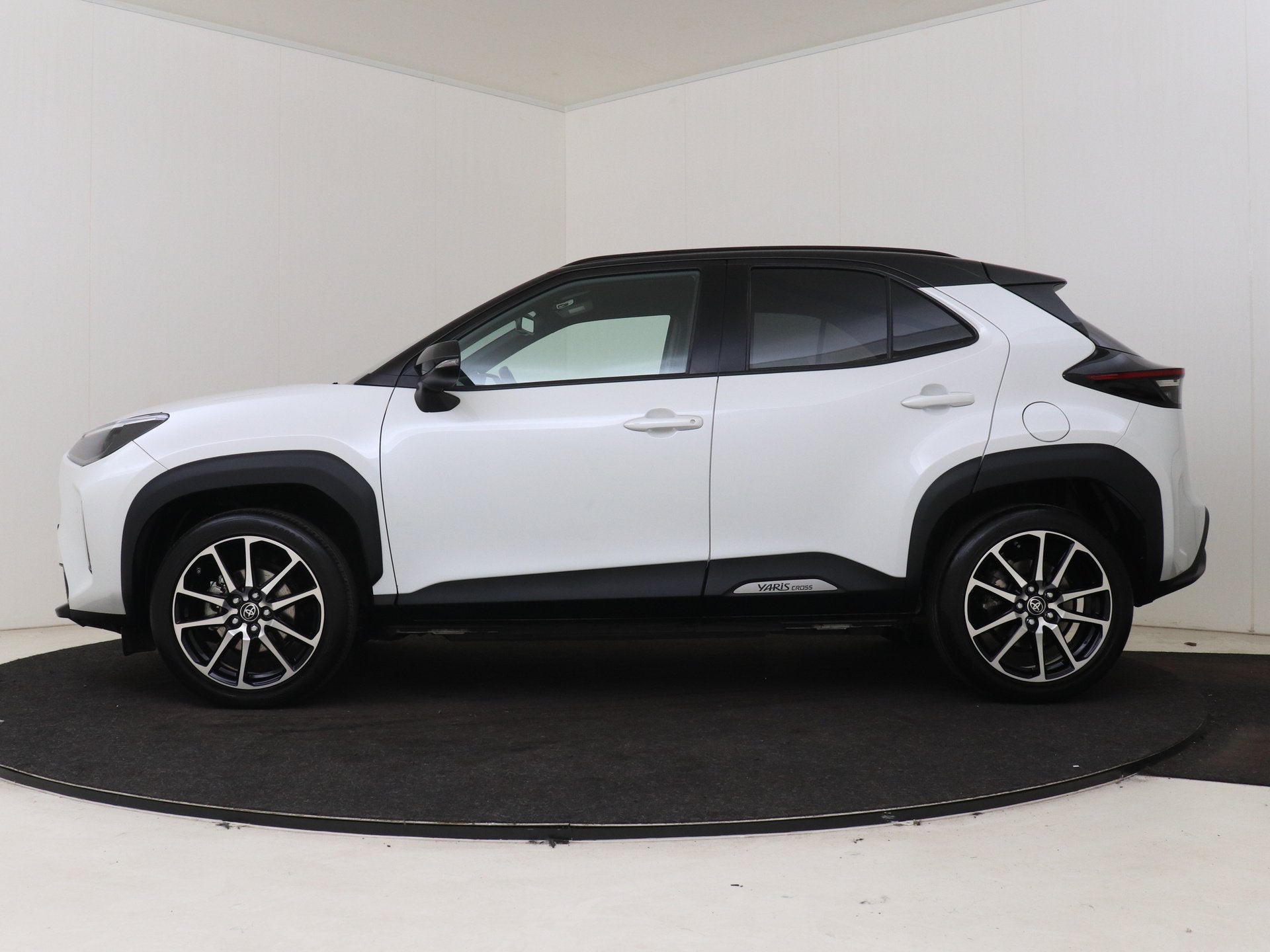 Toyota Yaris Cross 1.5 Hybrid GR Sport Limited | Dealer Onde, Auto's, Gebruikt, 116 pk, Wit, 1490 cc