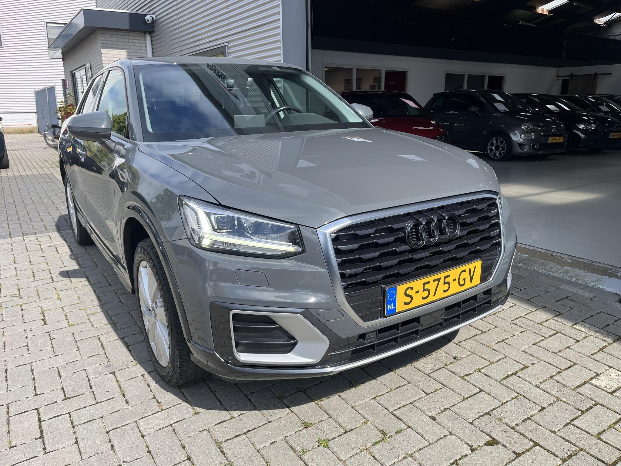 Audi Q2 1.0 TFSI Design Pro Line Plus Car-Play / Climatecont, Auto's, Stof, Gebruikt, 116 pk, Bedrijf