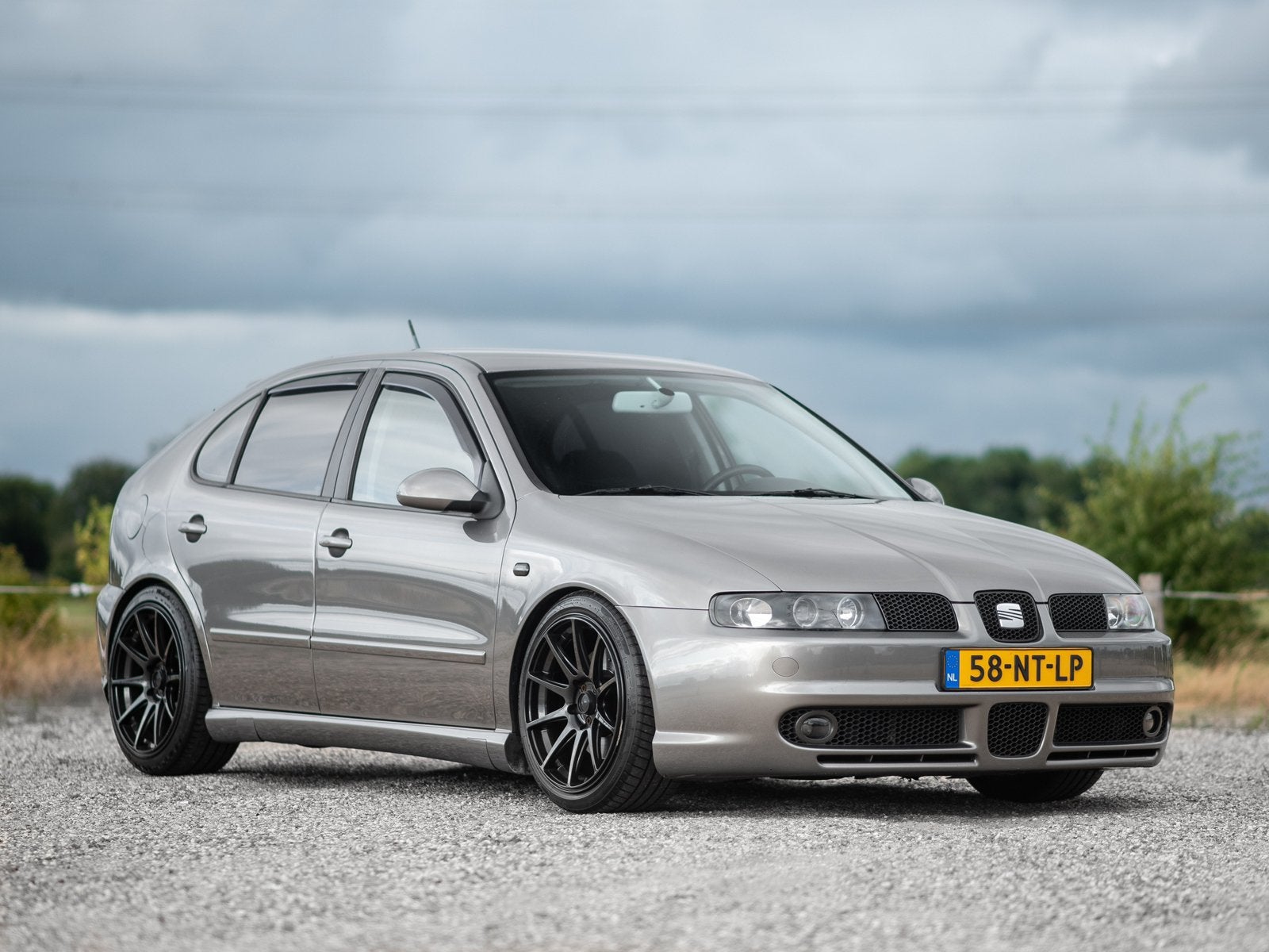 Seat Leon 1.8 20VT Topsport 180PK Cruise/Airco/18Inch, Voorwielaandrijving, Stof, Zwart, 4 cilinders