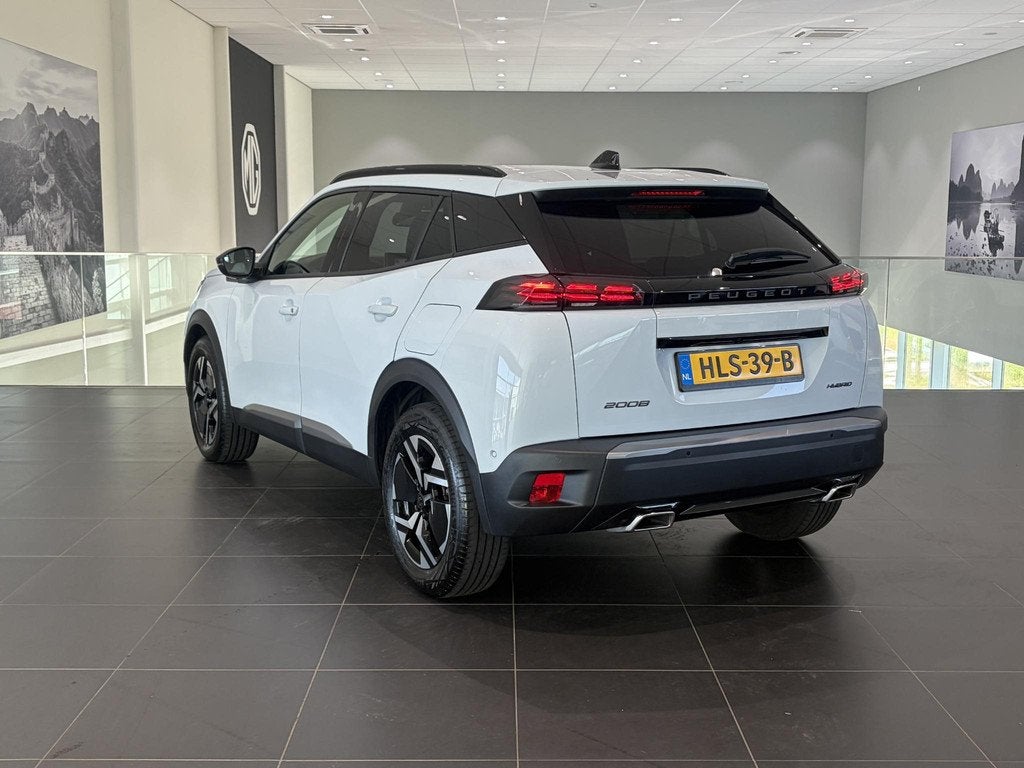 Peugeot 2008 1.2 Hybrid 145 Allure Hoge Instap! | Automaat |, Auto's, Gebruikt, Euro 6, 1199 cc, Leder en Stof