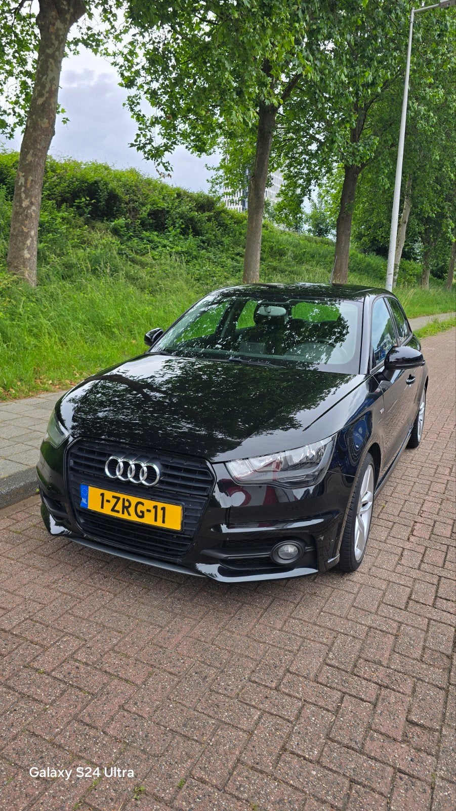 Audi A1 1.2 Tfsi 63KW SB Sline 2015 Zwart, Auto's, Audi, Voorwielaandrijving, Euro 5, 4 cilinders, Leder en Stof