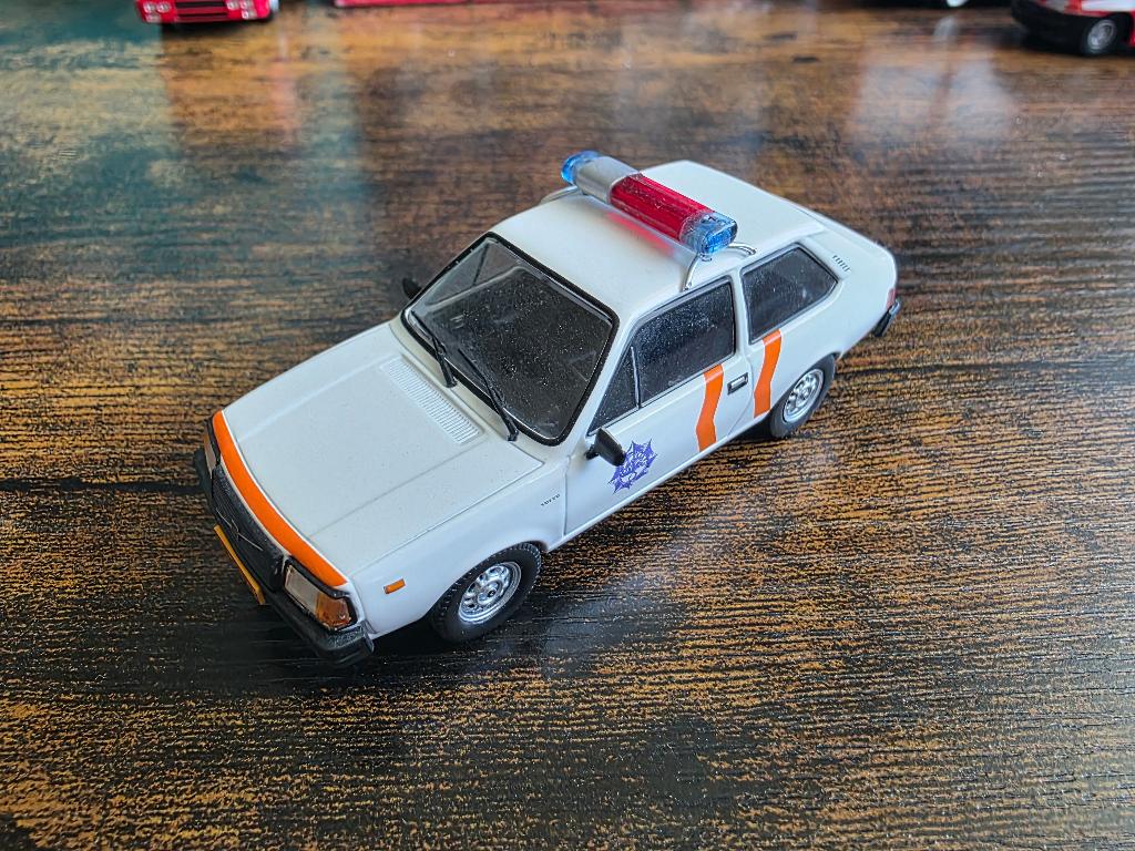 Volvo 343 Atlas 1:43 politie auto, Ophalen of Verzenden, Gebruikt, Auto, Overige merken