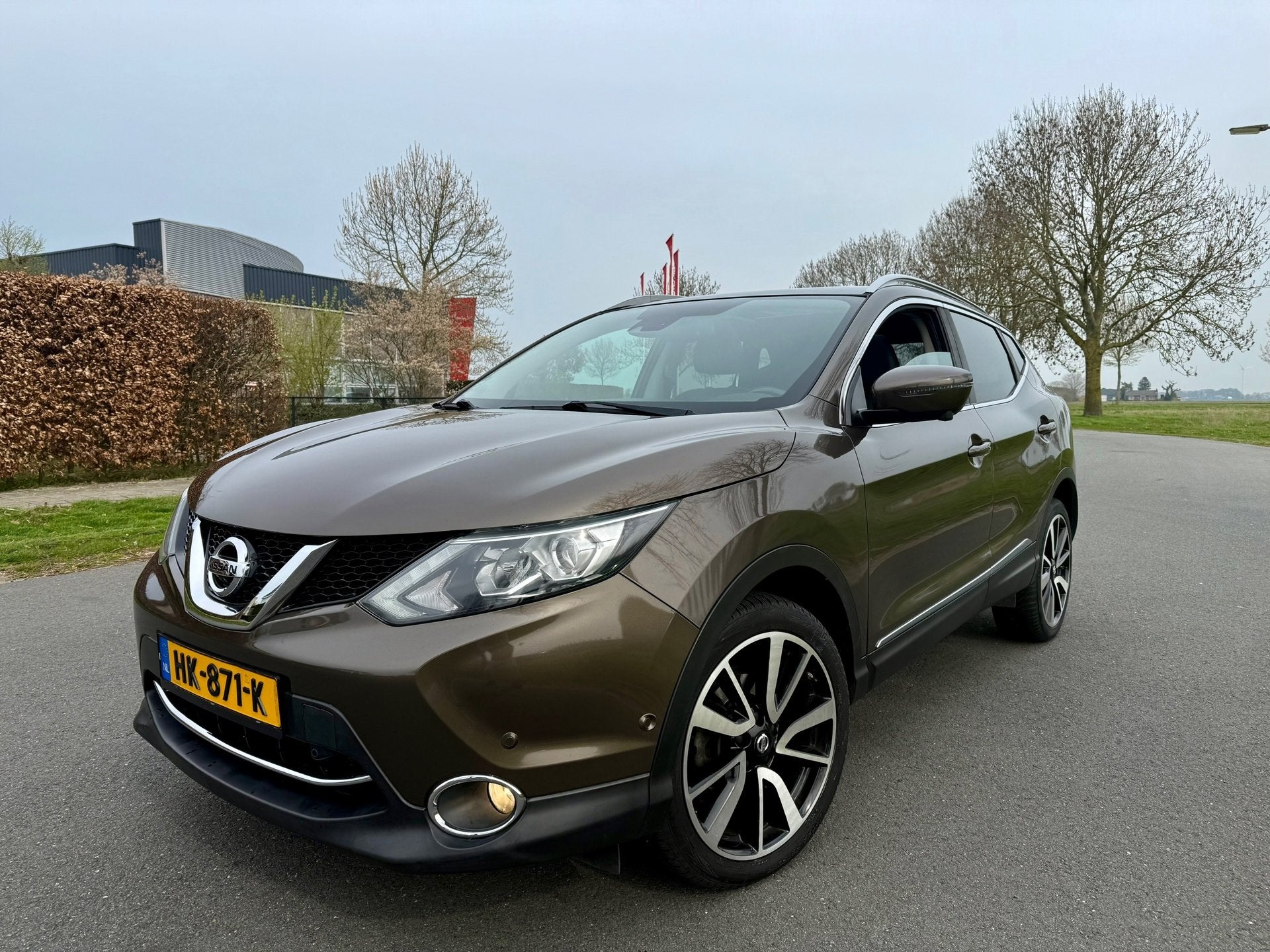 Nissan Qashqai 1.2 Tekna PANO/NAVI/CLIMA/LEER/CAMERA, Auto's, Nissan, Dealer onderhouden, Gebruikt, 4 cilinders, Bruin