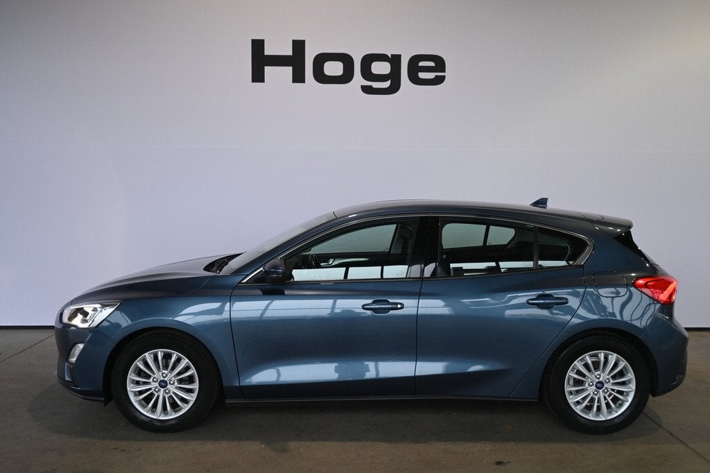 Ford Focus 1.0 EcoBoost Titanium Business Clima Navigatie St, Stof, Gebruikt, Met garantie (alle), Blauw