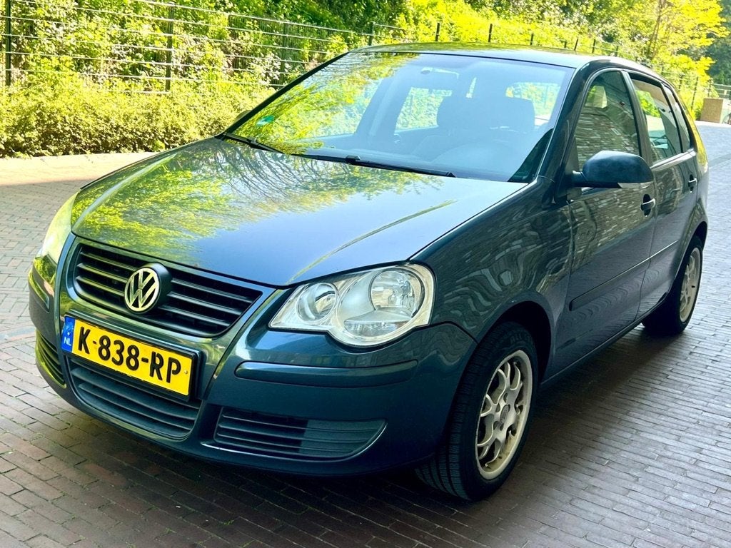 Volkswagen Polo 1.2 Highline, BJ 2006 Scherm Netjes, Auto's, Volkswagen, Voorwielaandrijving, Euro 5, Stof, Zwart