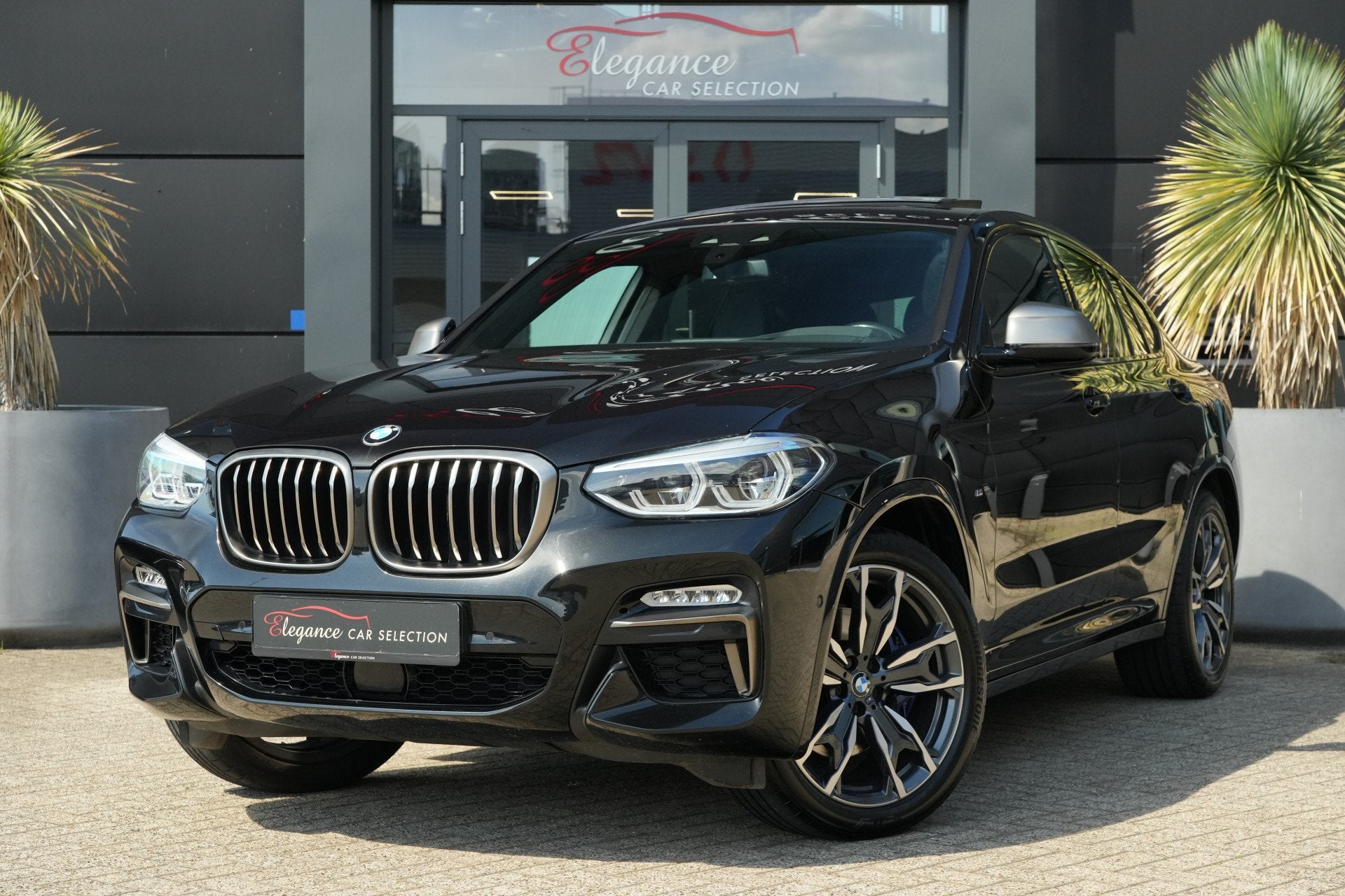 BMW X4 M40i High Executive | 354 PK | Panoramadak | Lederen, Automaat, 1800 kg, Gebruikt, Zwart