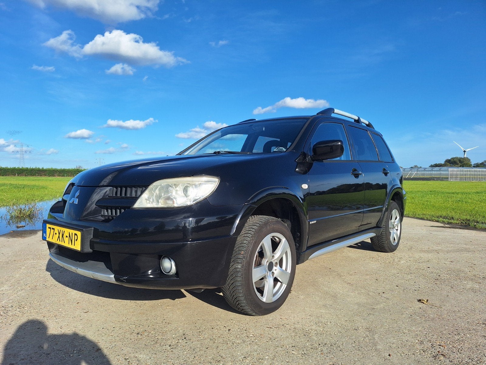 Mitsubishi Outlander 2.4 MPI 4WD 2007 Zwart, Auto's, Outlander, 4 cilinders, 160 pk, Zwart