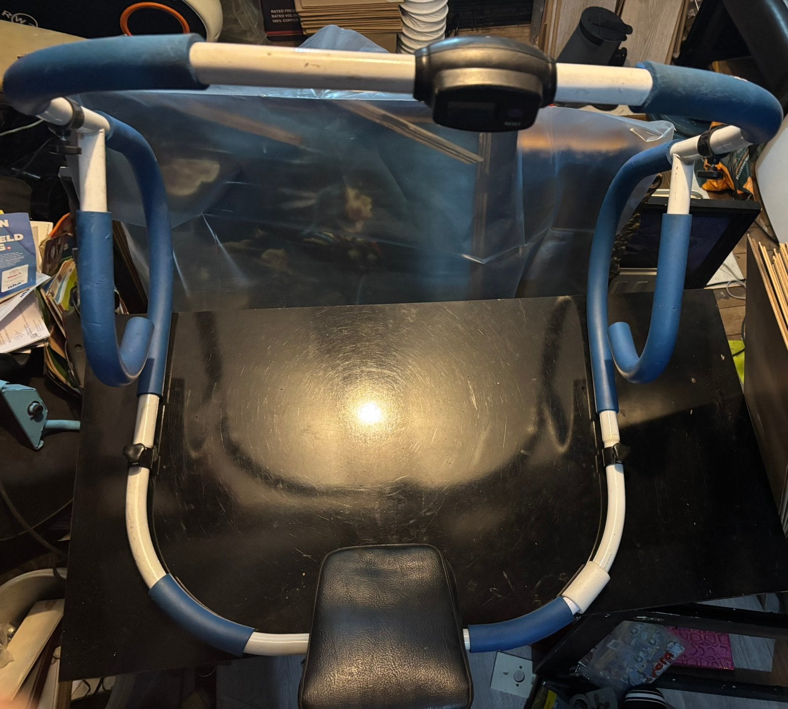 Ab trainer voor de buikspieren, Ophalen