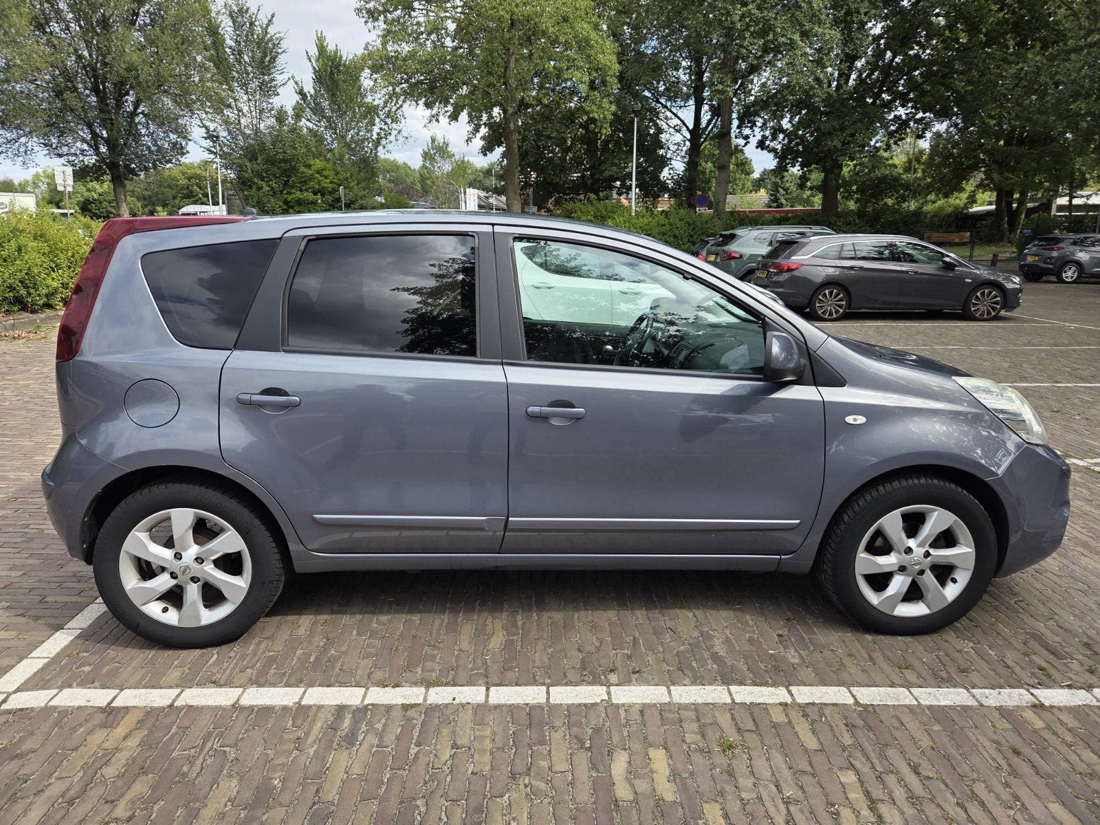 Nissan Note 1.6 16V AUT 2009 Blauw, Auto's, 15 km/l, 750 kg, 4 cilinders, Blauw