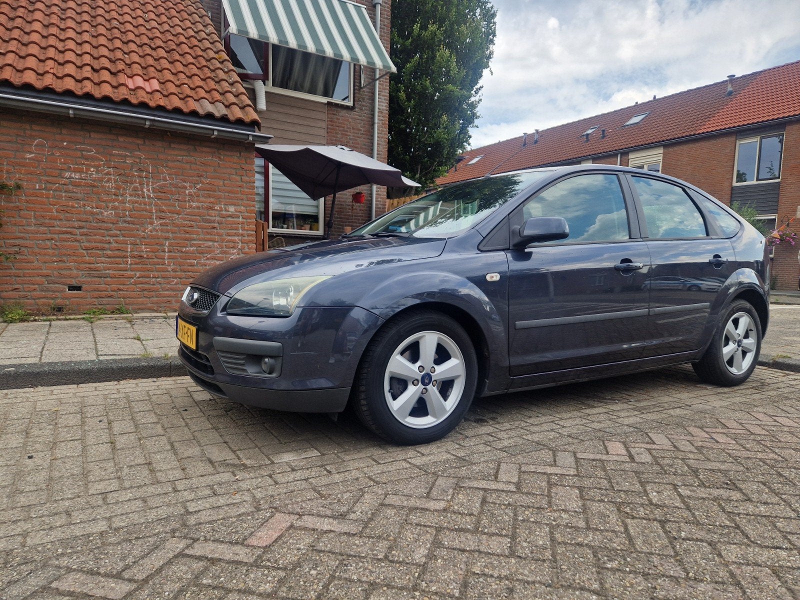 Ford Focus 1.6 74KW 5D 2007 Grijs, Auto's, 1596 cc, 4 cilinders, 49 €/maand, Origineel Nederlands
