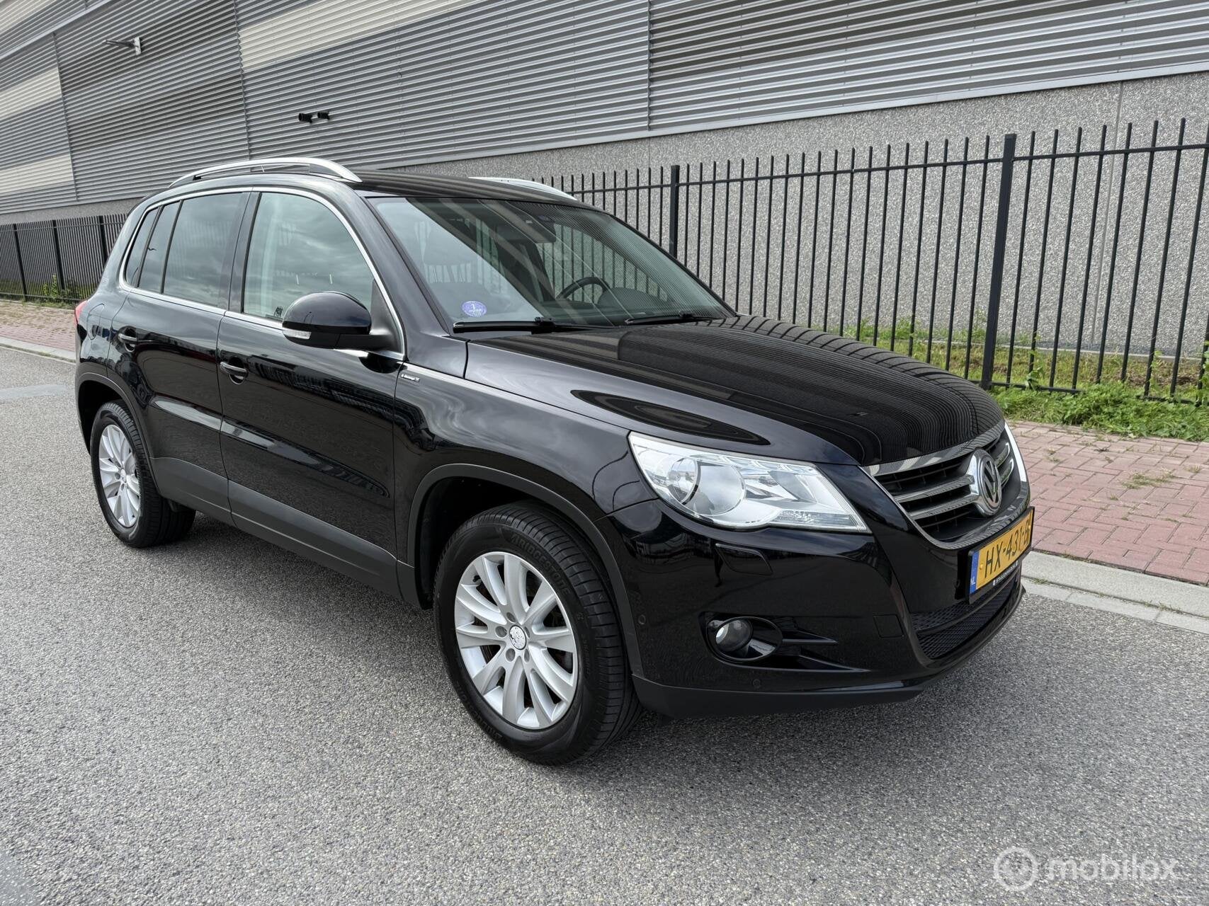 Volkswagen Tiguan 1.4 TSI Sport&Style 1800 KG Trekgewicht, Auto's, Voorwielaandrijving, 15 km/l, 4 cilinders, 150 pk