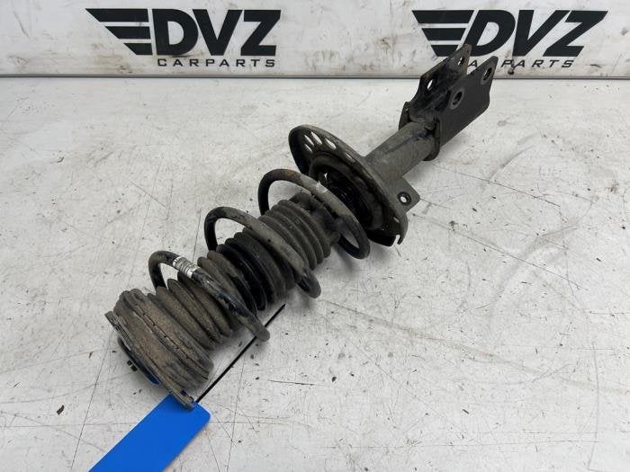 Schokdemper links-voor van een Opel Astra, Auto-onderdelen, Ophanging en Onderstel, Opel, Gebruikt, 3 maanden garantie, Ophalen of Verzenden