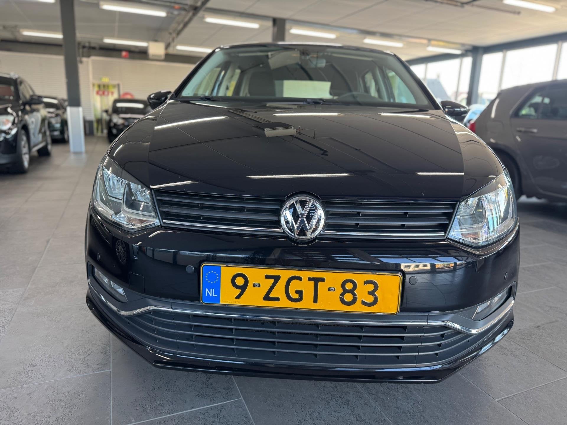 Volkswagen Polo 1.2 TSI Comfortline automaat Clima navigatie, Auto's, Stof, Gebruikt, Euro 6, 4 cilinders