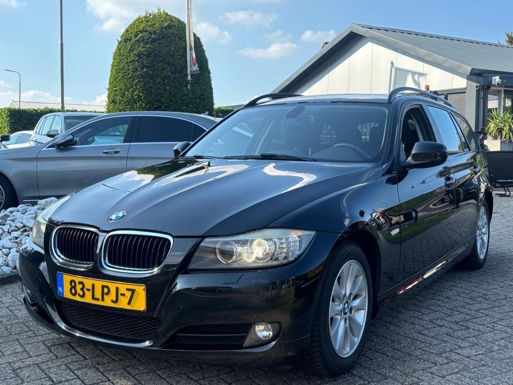 BMW 3 Serie Touring 318i Sport 2010 Zwart Xenon Navi, Euro 5, Zwart, Origineel Nederlands, Handgeschakeld