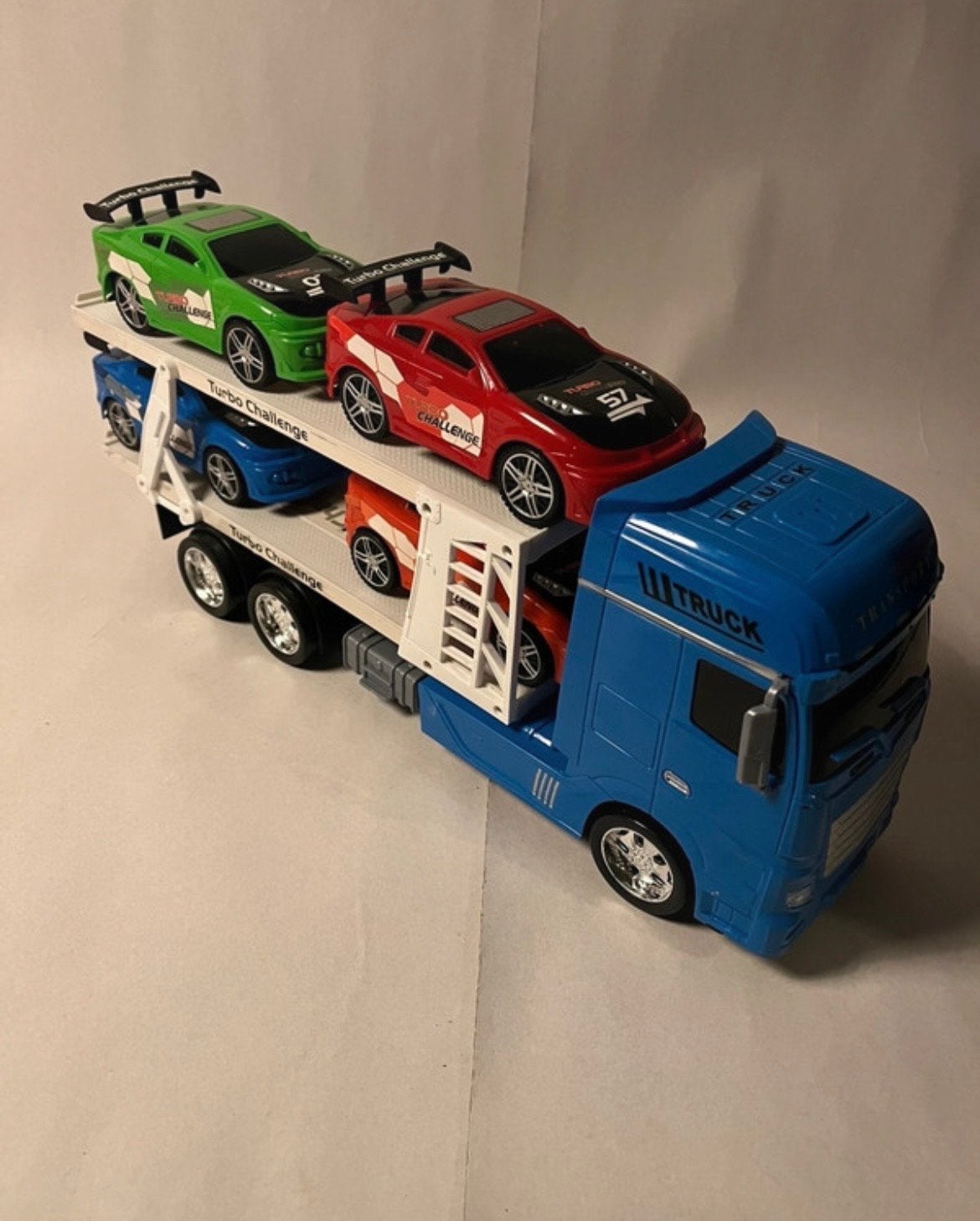Speelgoed vrachtwagen met raceauto's, Ophalen of Verzenden, Zo goed als nieuw