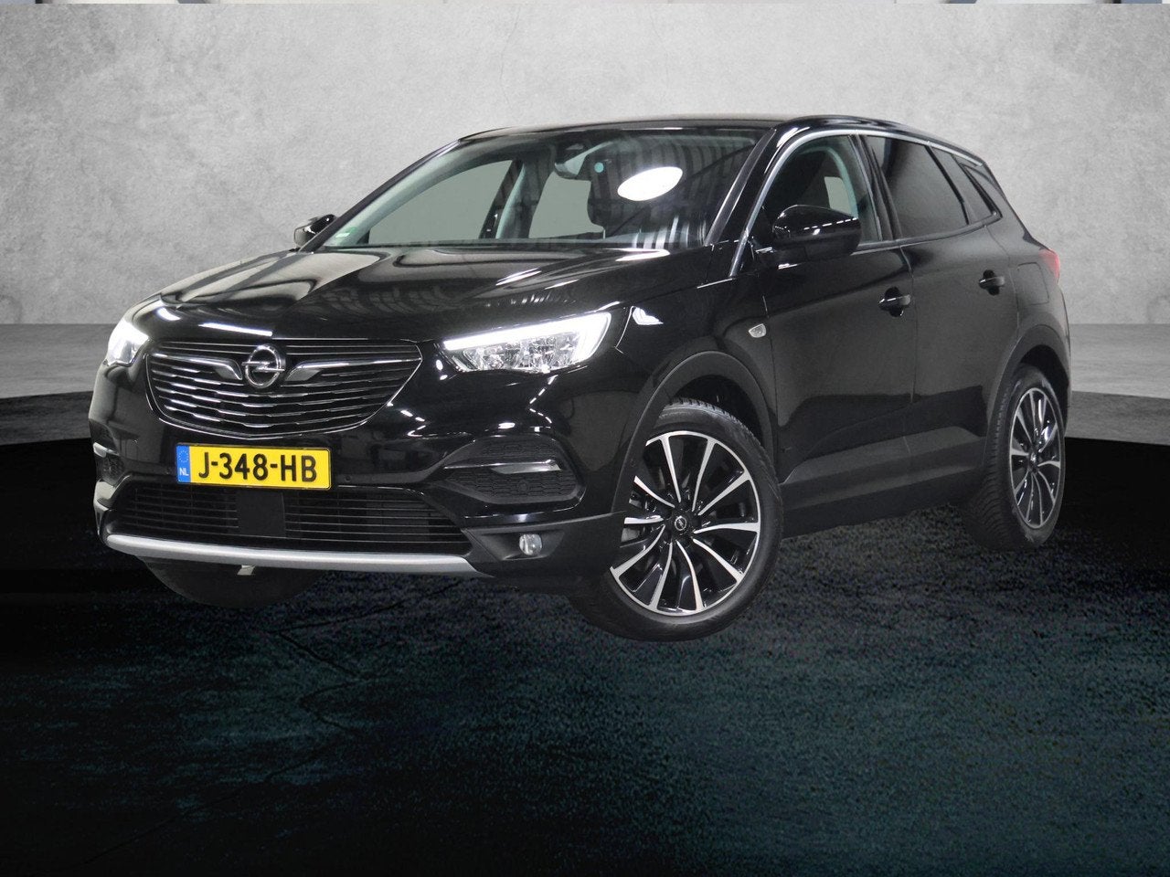 Opel Grandland X 225PK Hybrid Elegance | Trekhaak | Camera |, Auto's, 228 pk, 4 cilinders, 1600 cc, Zwart