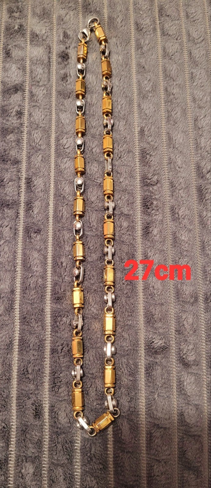 Goudkleurige en zilverkleurige armband - 27cm, Ophalen of Verzenden, Nieuw, Goud, Overige materialen