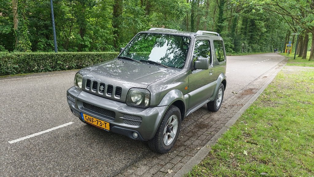 Suzuki Jimny 2006 Grijs Handgeschakeld, Auto's, Suzuki, 4 stoelen, Leder en Stof, Vierwielaandrijving, Particulier