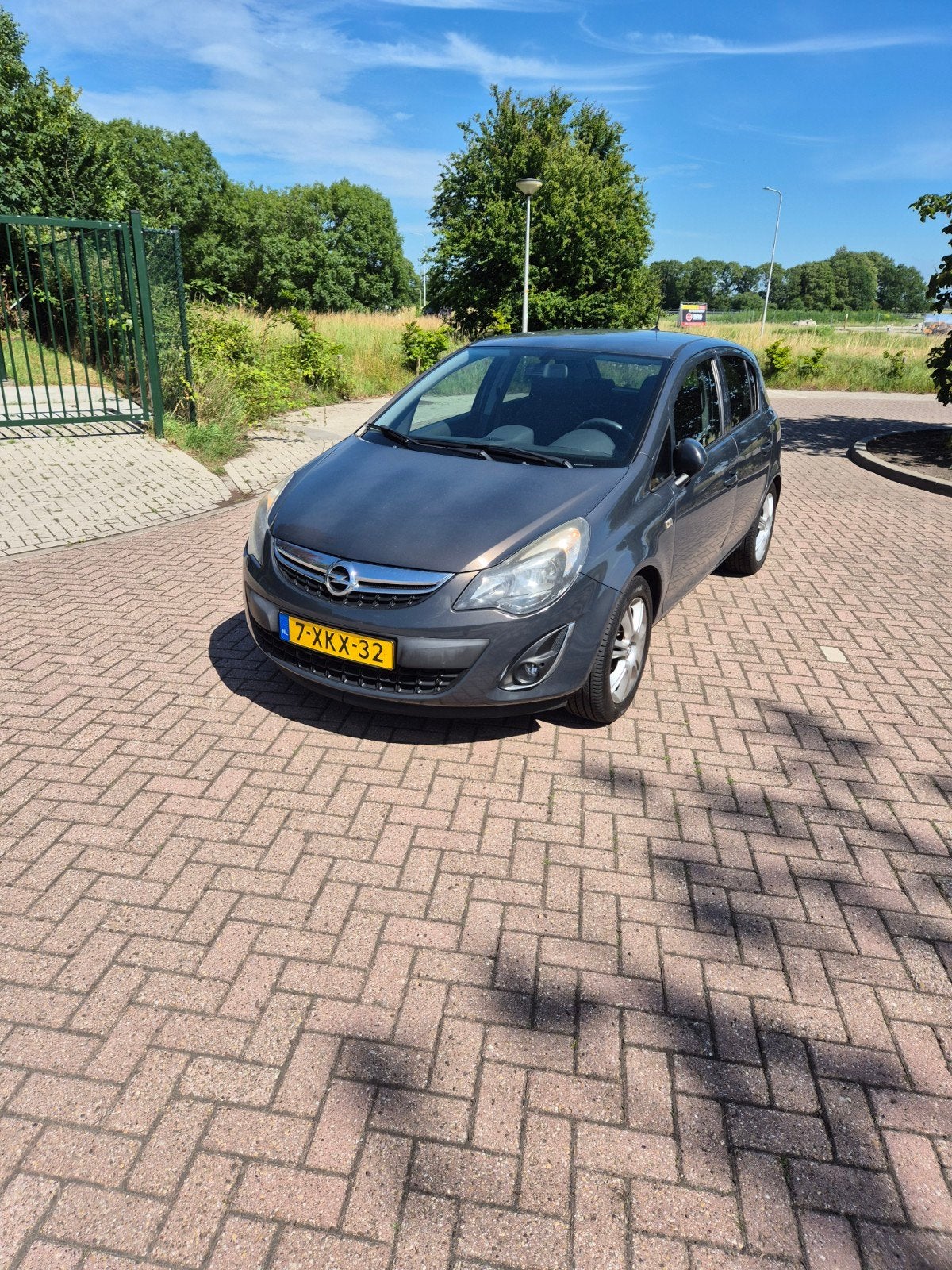 Opel Corsa 1.2 16V 5D 2014 Grijs met 12 maanden garantie, Auto's, Voorwielaandrijving, Euro 5, 4 cilinders, 1229 cc