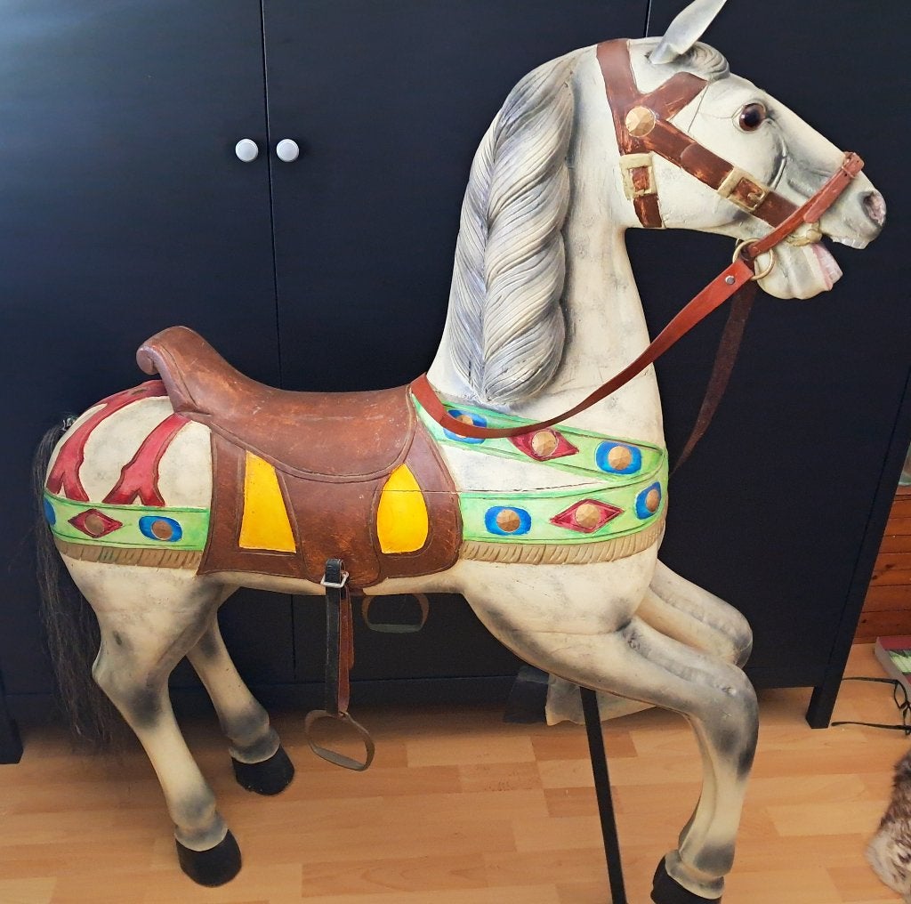 Carrouselpaard, Ophalen