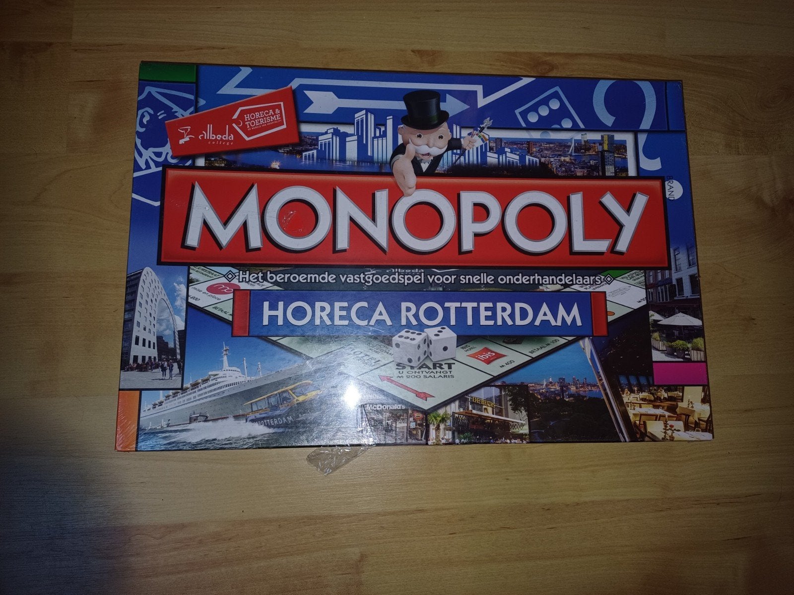Monopoly Horeca Rotterdam - Het beroemde vastgoedspel, Drie of vier spelers, Ophalen of Verzenden, Zo goed als nieuw, Rand