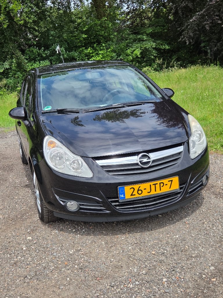 Opel Corsa 1.4 16V 5D 2009 Zwart, Auto's, Voorwielaandrijving, 1063 kg, Zwart, 4 cilinders