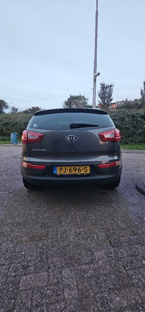 Kia Sportage 1.6 GDI 2WD 2012 Grijs, Auto's, Voorwielaandrijving, Euro 5, 15 km/l, 1280 kg