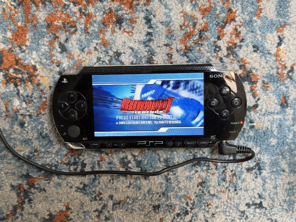 Sony PSP 1000 + 8 games + originele oplader en hoes, Zwart, Ophalen of Verzenden, PSP, Gebruikt