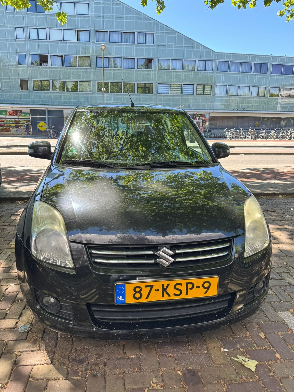 Suzuki Swift 1.3 5D 2010 Zwart, Auto's, Voorwielaandrijving, 40 €/maand, 400 kg, Origineel Nederlands