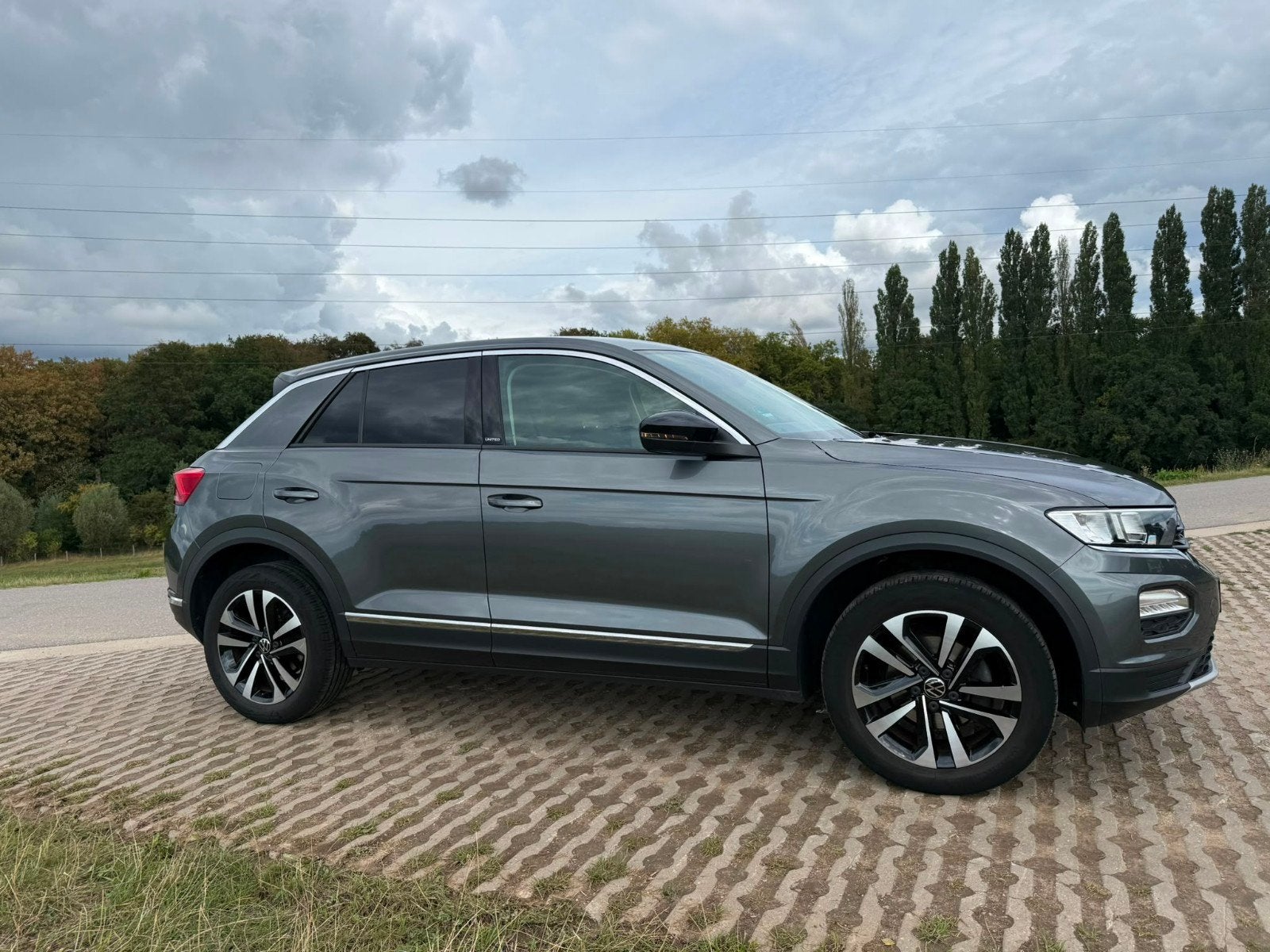 Volkswagen T-Roc 1.5 TSI 150pk 7-DSG 2020 Grijs, Auto's, 1254 kg, 1498 cc, 4 cilinders, Particulier