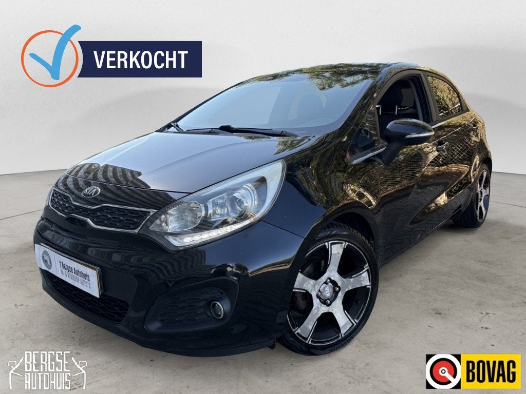 Kia Rio 1.2 CVVT Super Pack Clima Keyless Cruise Pdc Trekhaa, 21 km/l, Zwart, 4 cilinders, Zwart