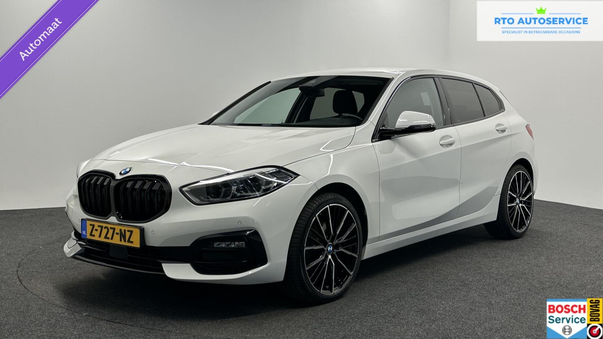 BMW 1-serie 118i Essential High Executve ECC LM CRUISE NAVI, Auto's, Gebruikt, 4 cilinders, Leder en Stof, Wit