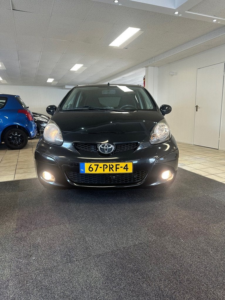 Toyota Aygo 1.0-12V Dynamic NavigatorAUTOMAAT.Airco, Auto's, Euro 5, Gebruikt, 4 stoelen, Origineel Nederlands