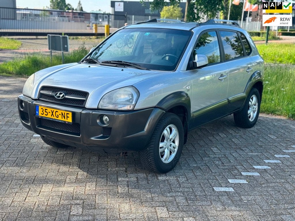 Hyundai Tucson 2.0i Style/Leder/Climatronic, Auto's, Hyundai, Bedrijf, Te koop, Tucson, ABS, Airbags, Airconditioning, Automatische klimaatregeling