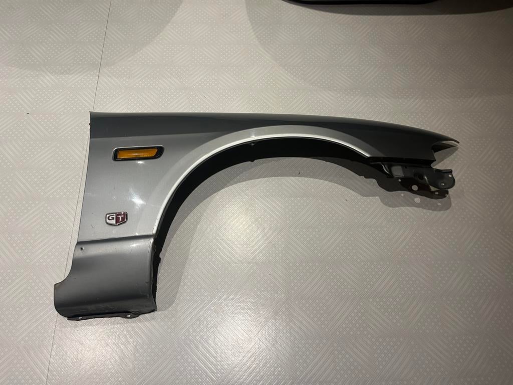 Nissan Skyline R33 GTS-T spatbord rechtsvoor (chauffeur), Gebruikt, Voor, Ophalen of Verzenden, Spatbord
