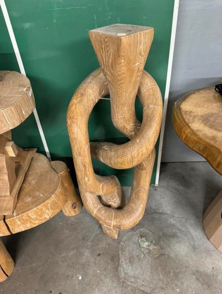 Apart houten beeld van eiken boomstam, Ophalen