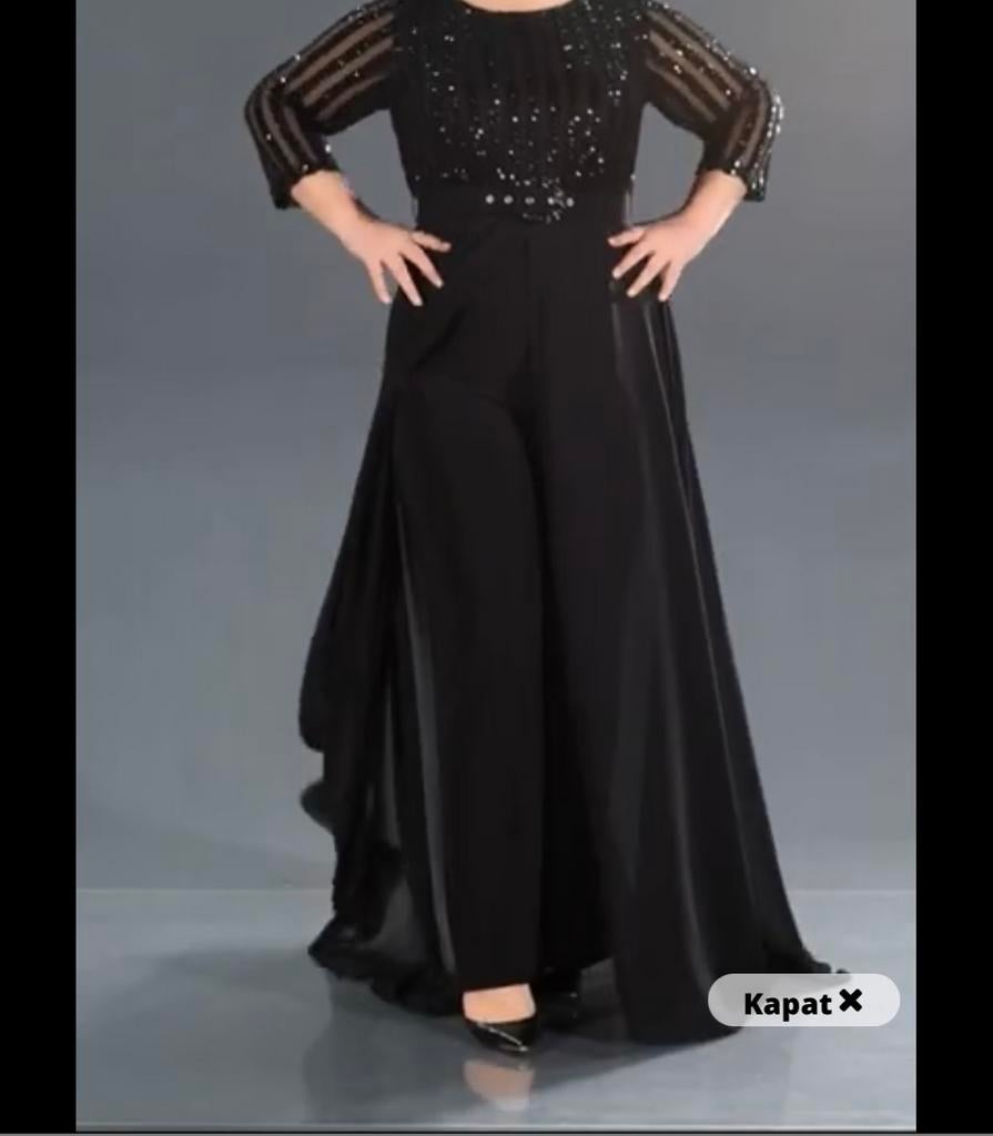 Avond/gala/feest jurk jumpsuit, Ophalen of Verzenden, Zo goed als nieuw, Maat 42/44 (L), Zwart