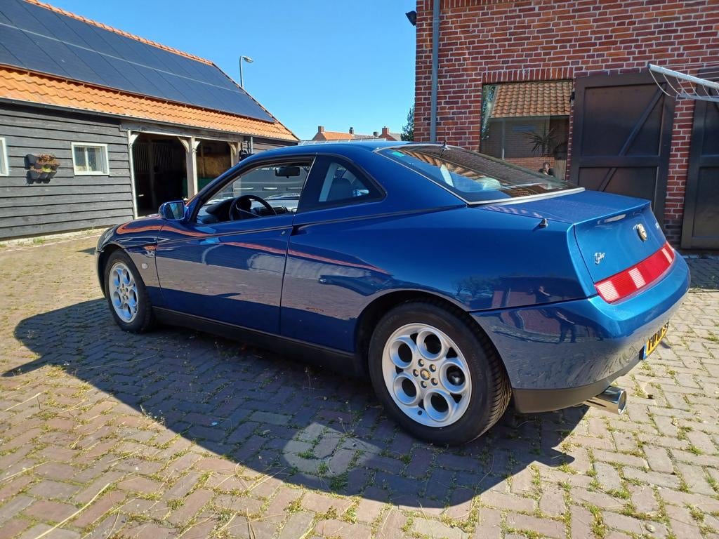 Alfa Romeo GTV 2.0 V6 Turbo 1996 Blauw, Auto's, Alfa Romeo, Voorwielaandrijving, 1380 kg, 201 pk, Blauw