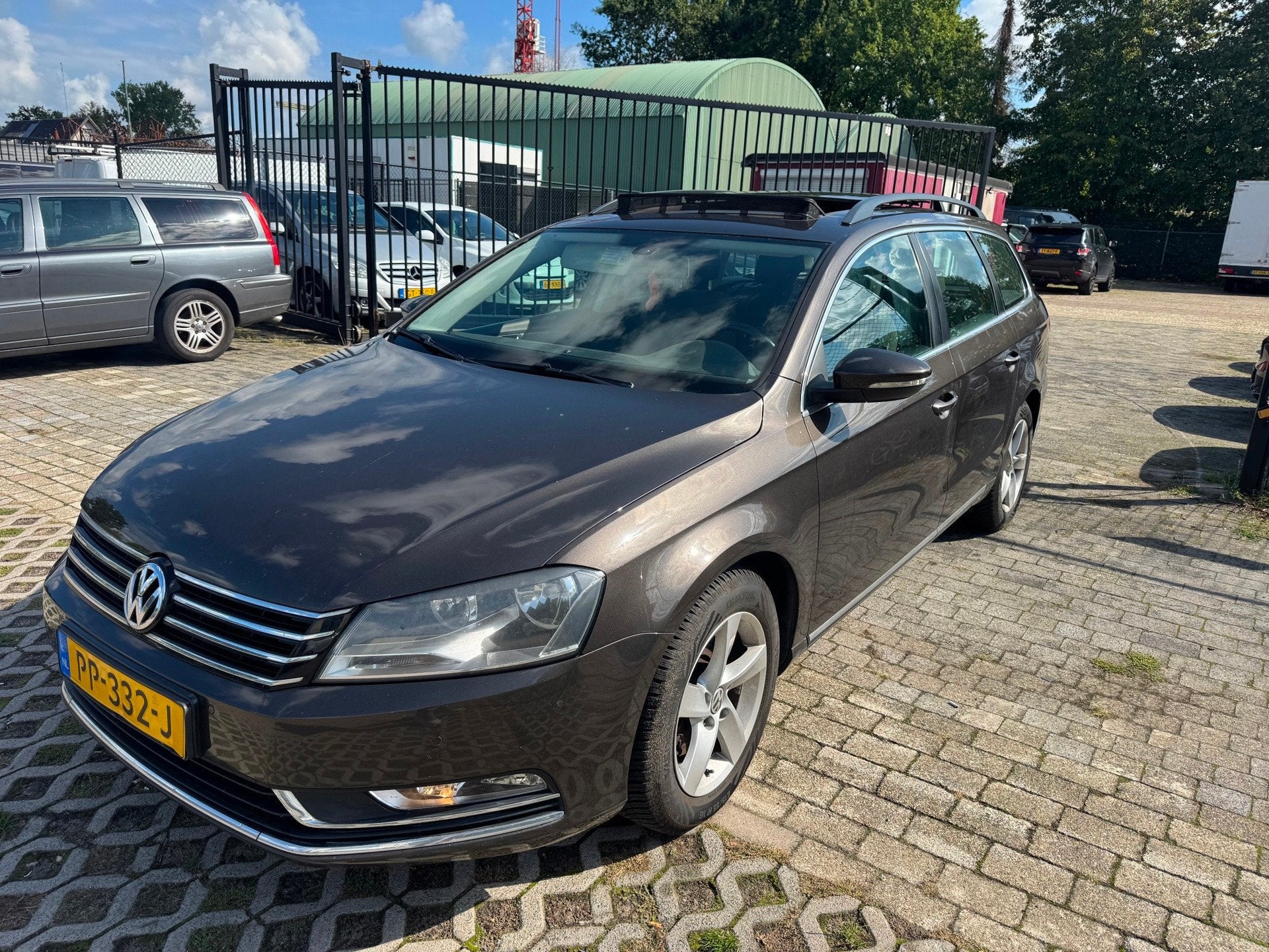 Volkswagen Passat Variant 1.6 TDI Highline BlueMotion, Auto's, Euro 5, Gebruikt, 4 cilinders, Bruin
