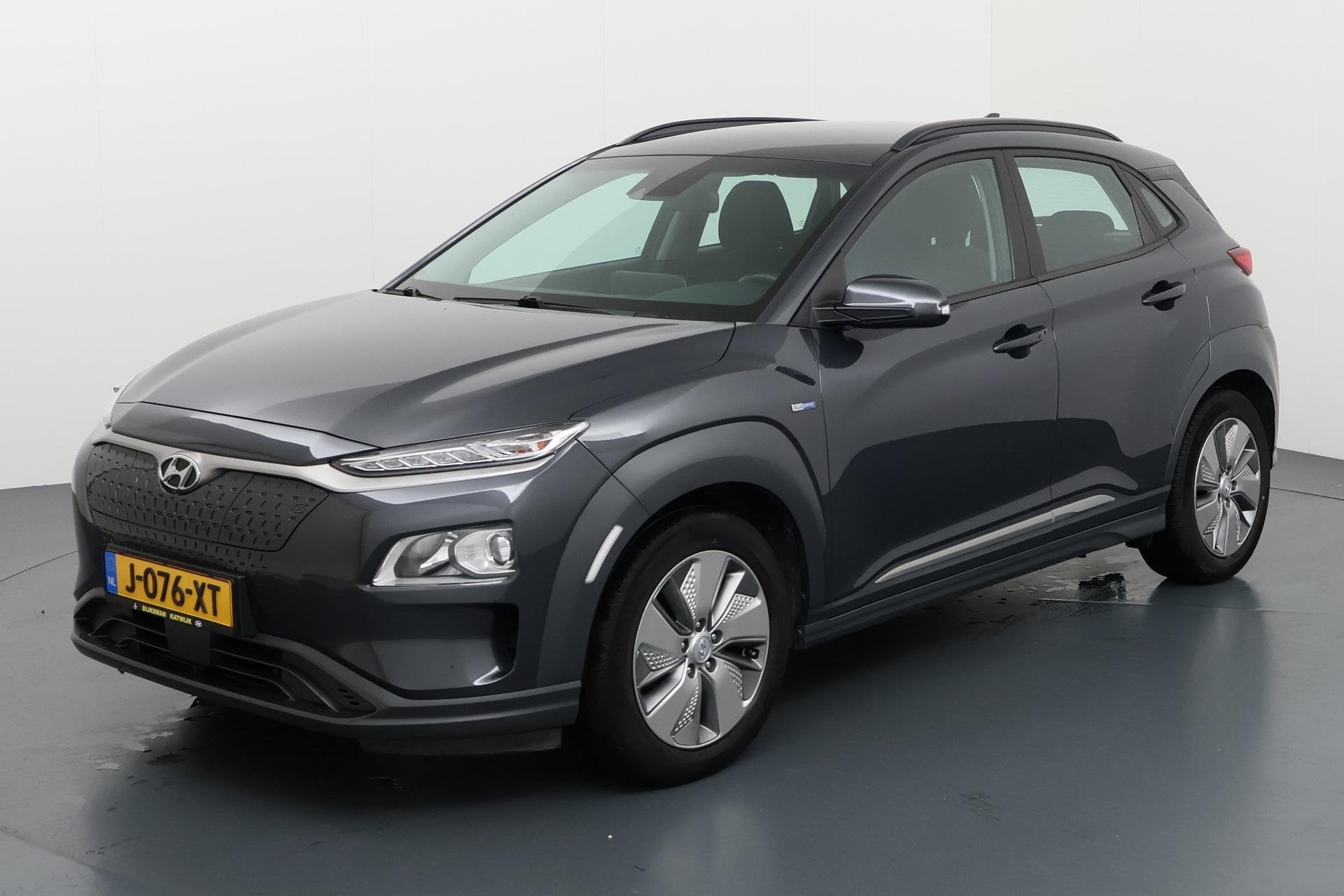 Hyundai Kona EV Comfort 64 kWh Slim en zuinig elektrisch rij, Auto's, Stof, Gebruikt, Origineel Nederlands, 64 kWh