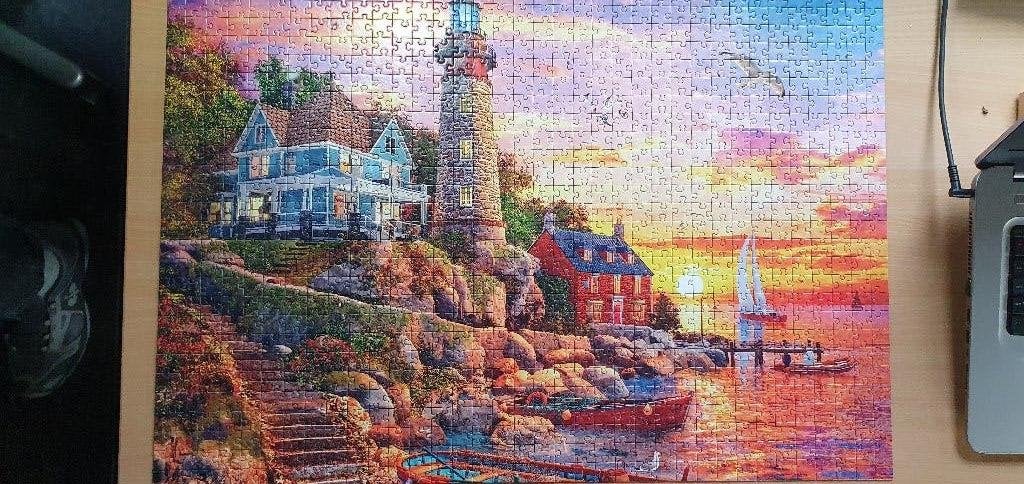 Legpuzzel 1000 stukjes - Vuurtoren bij zonsondergang, Ophalen of Verzenden, 500 t/m 1500 stukjes, Gebruikt, Legpuzzel