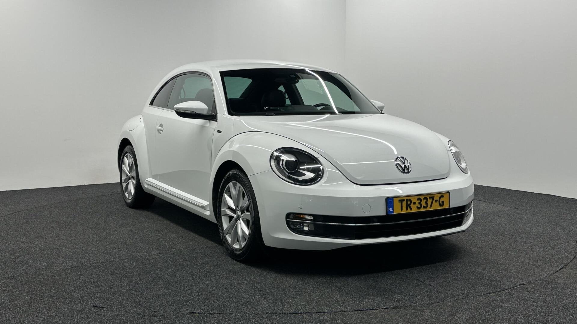 Volkswagen Beetle 1.2 TSI Exclusive Series LEER NAVI CRUISE, Auto's, Voorwielaandrijving, Gebruikt, 4 cilinders, Met garantie (alle)