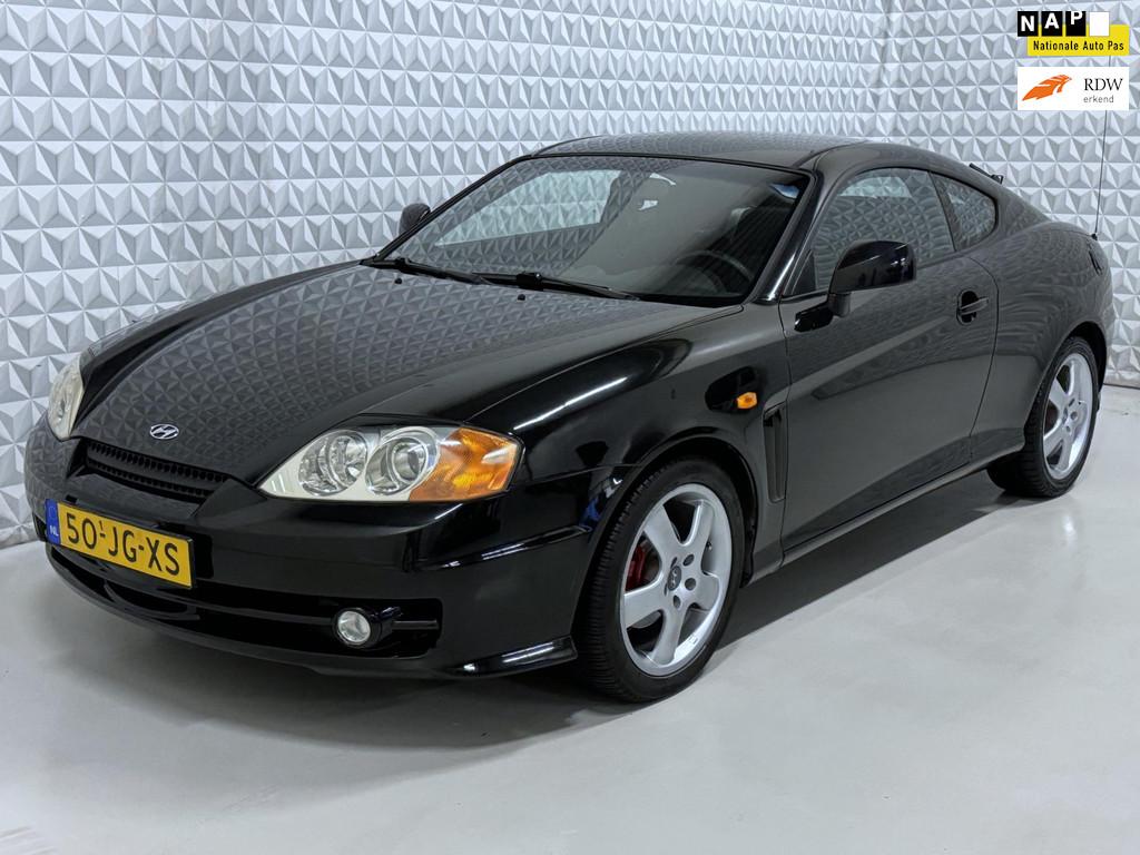 Hyundai Coupé 2.7i V6 FX met onderhoudshistorie! (2002), Auto's, Hyundai, Gebruikt, Coupé, 4 stoelen, 2656 cc