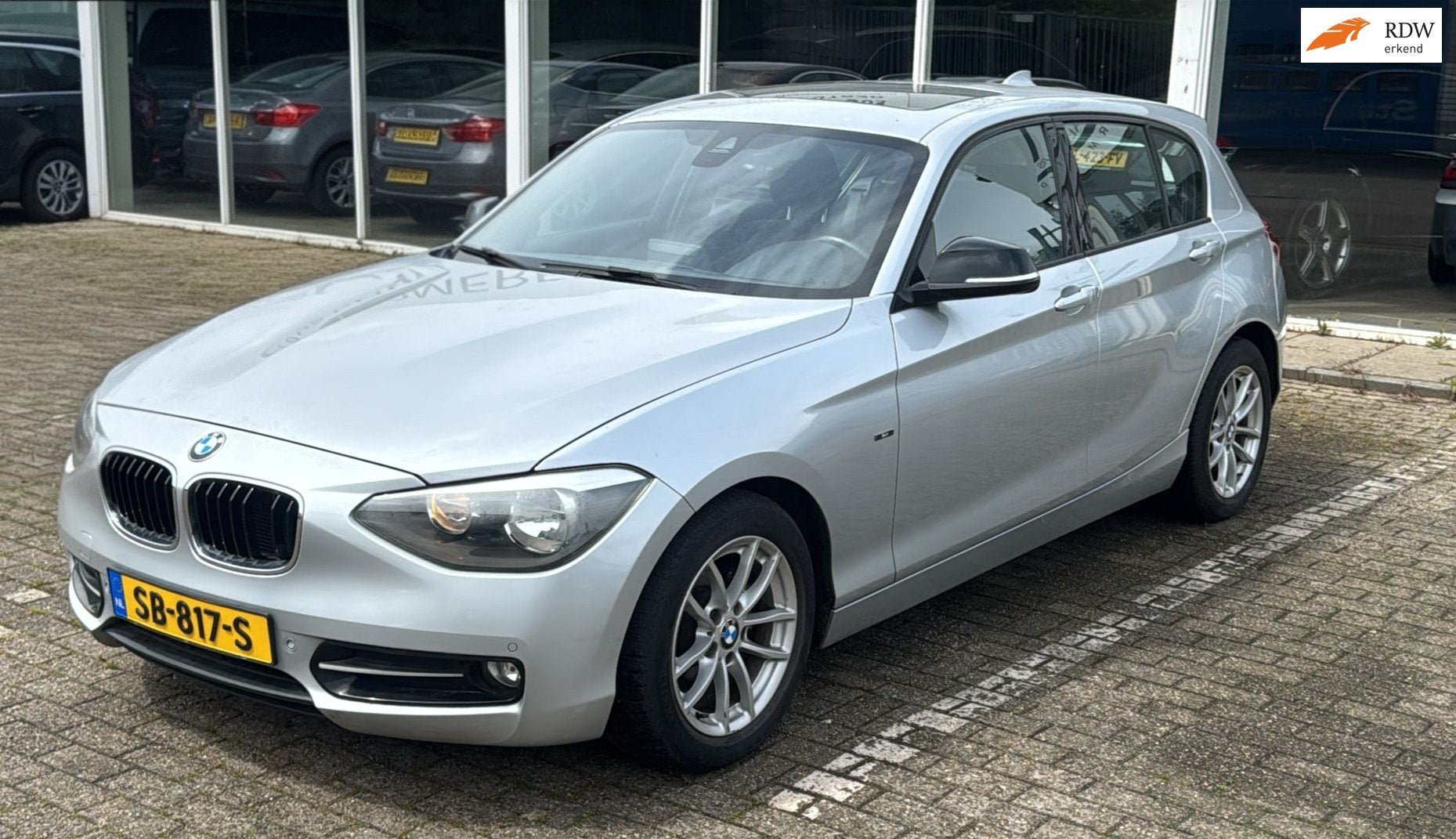 BMW 1-serie 116i Business+ Sport, Auto's, BMW, 1-Serie, Euro 5, Gebruikt, Zwart