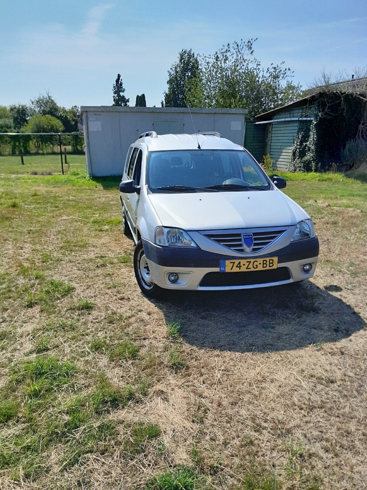 Dacia Logan 1.6 MCV 64KW 7P 2008 Grijs, Auto's, 4 cilinders, 620 kg, Origineel Nederlands, Stationwagon